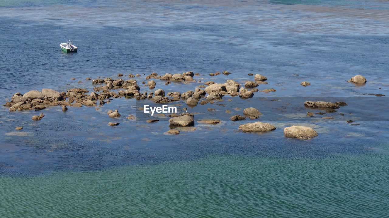 High angle view of rocks on beach