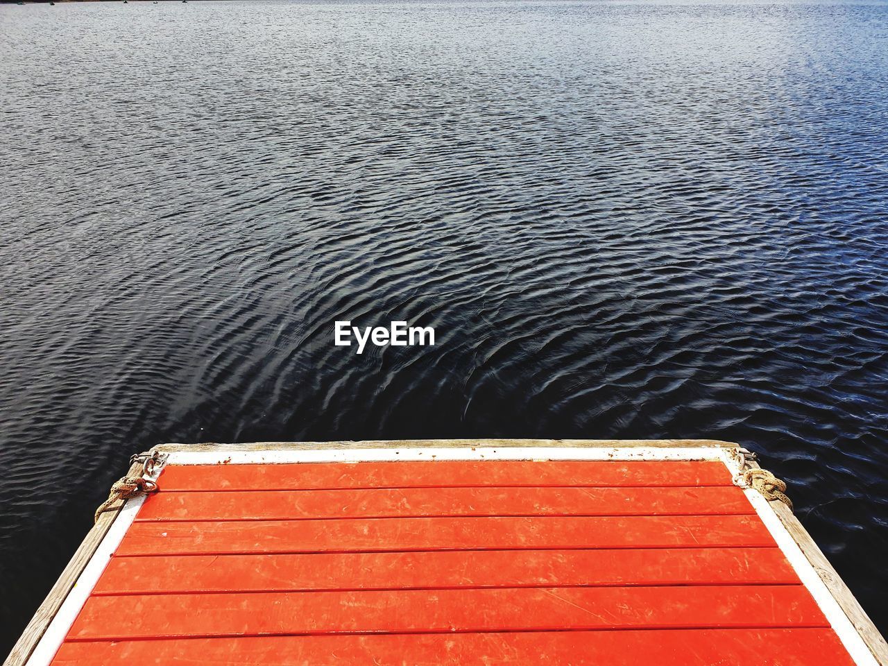 High angle view of pier against lake