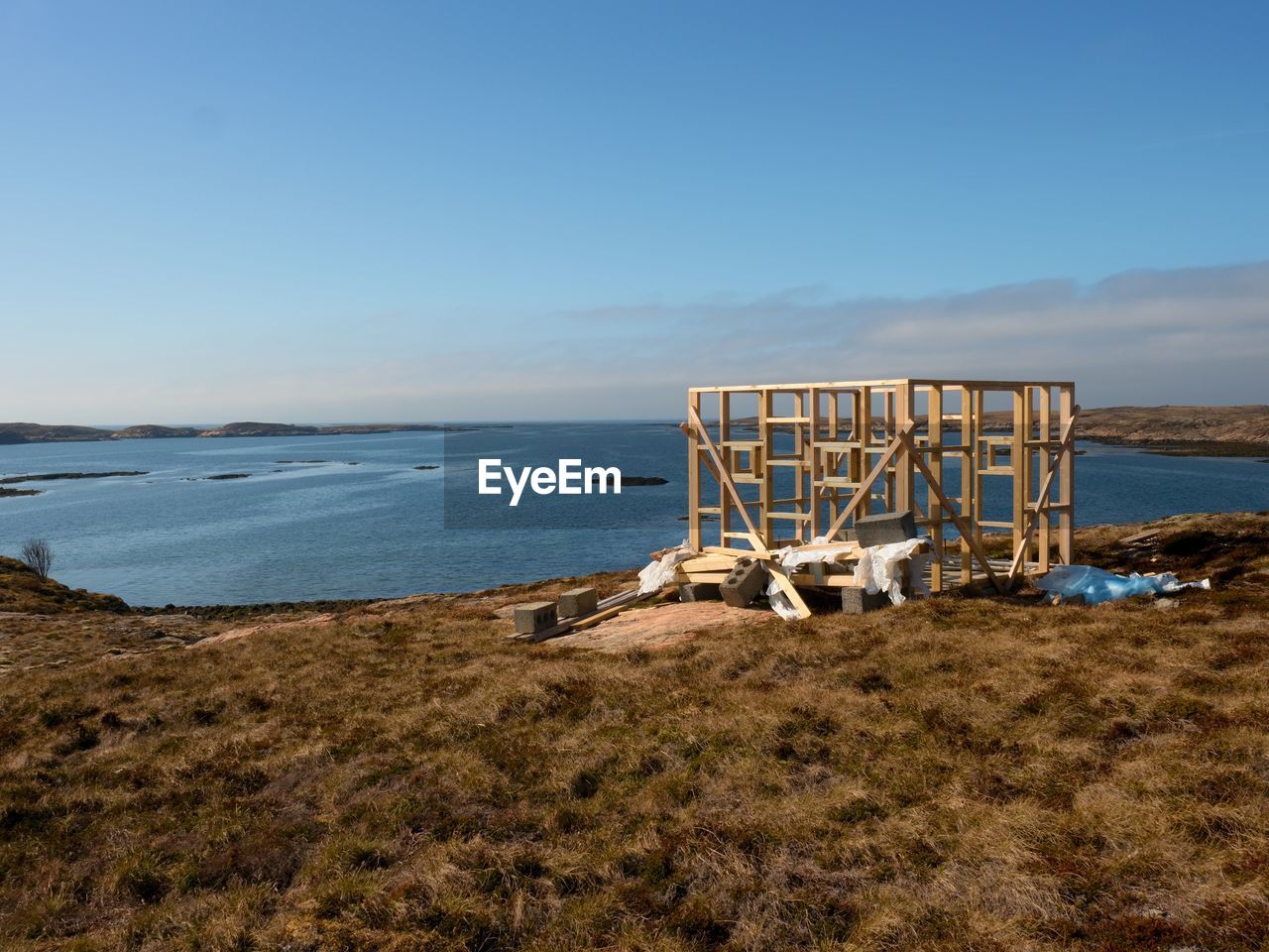 Building of bird observation tower, stony island norway. wooden construction of lookout tower