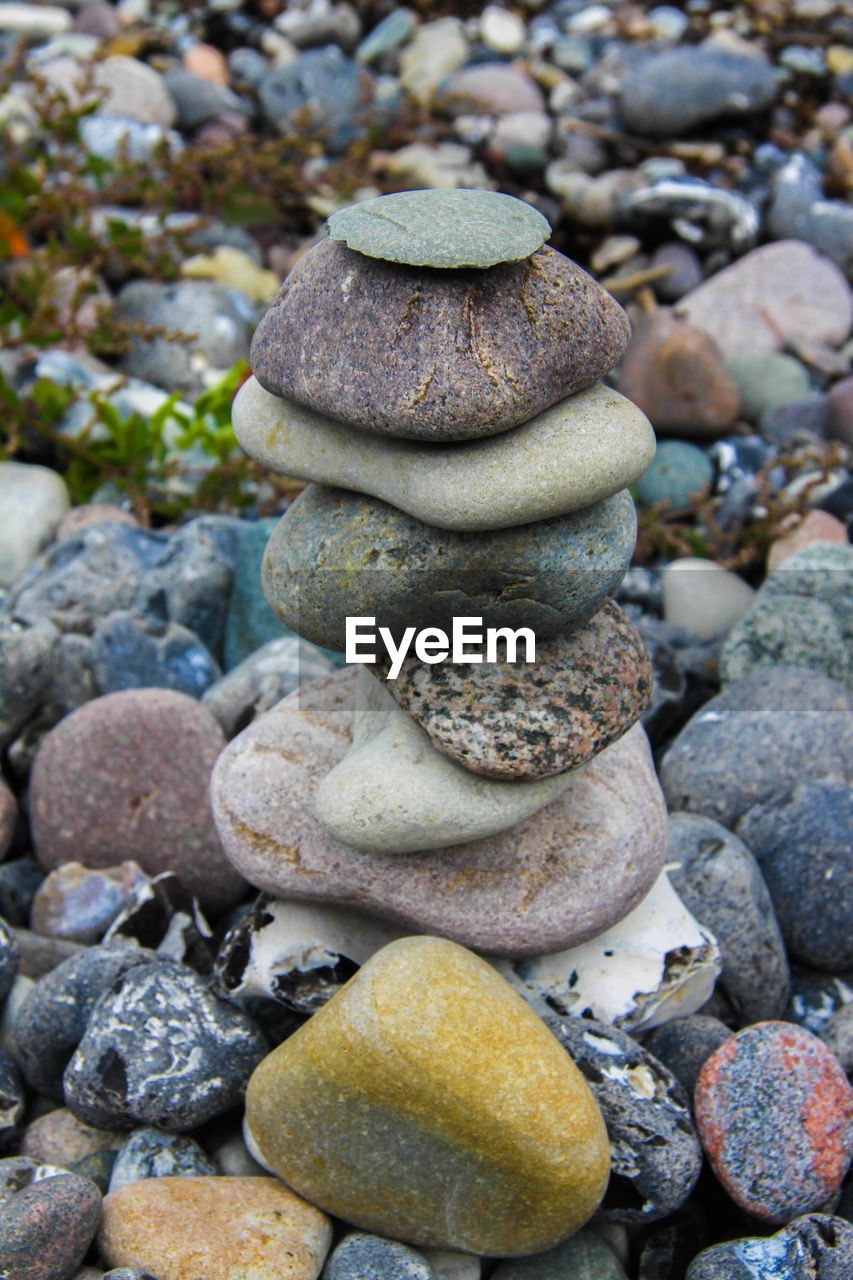 CLOSE-UP OF STACK OF STONES