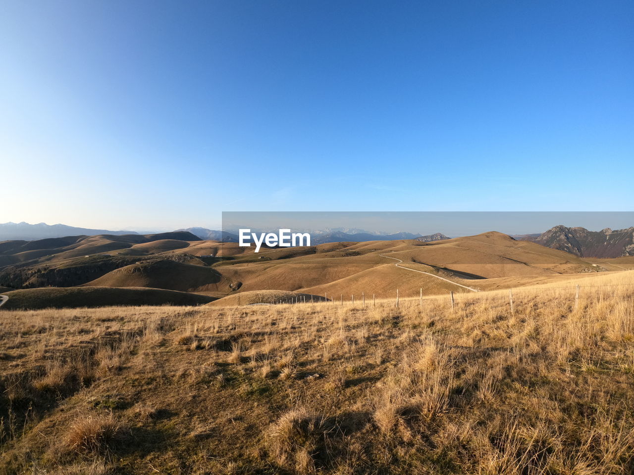 PANORAMIC VIEW OF LANDSCAPE AGAINST CLEAR BLUE SKY