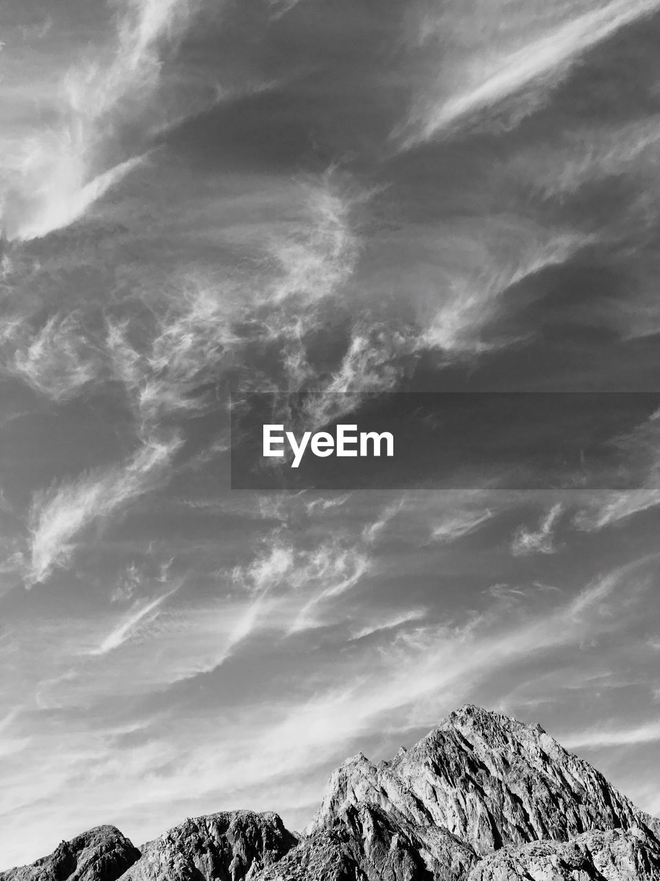 Low angle view of rock formation against sky