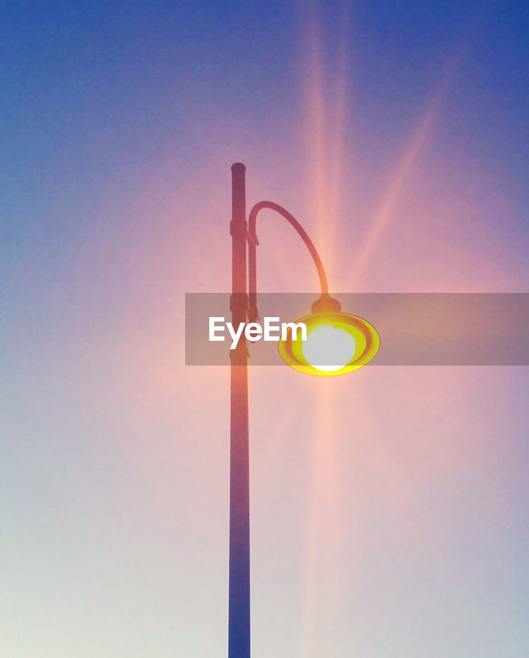 LOW ANGLE VIEW OF STREET LIGHT AGAINST SKY