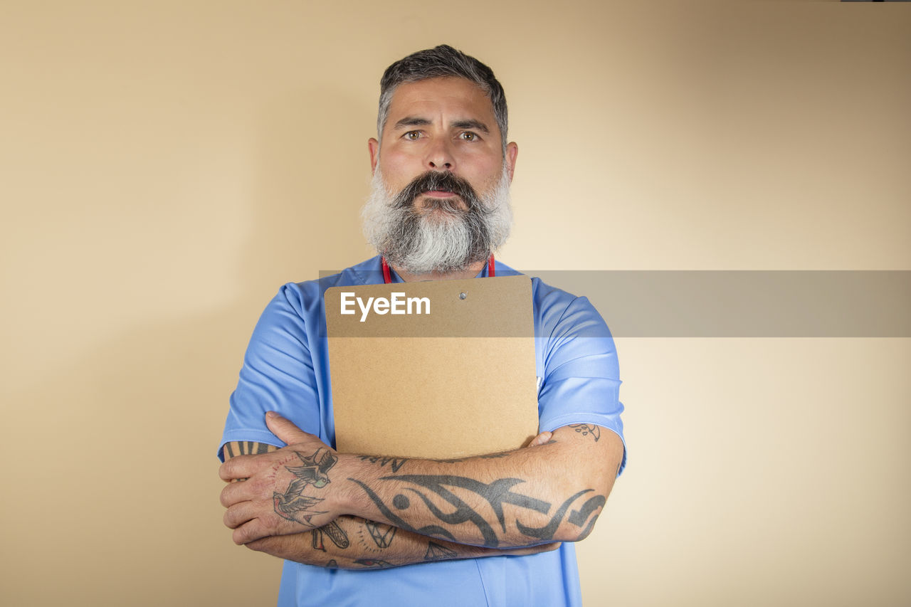 Portrait of a male nurse on a light background person