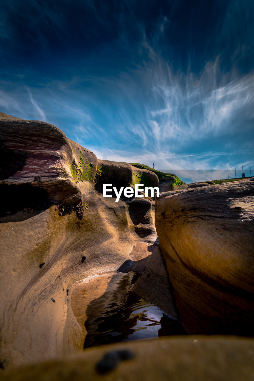 scenic view of desert against sky