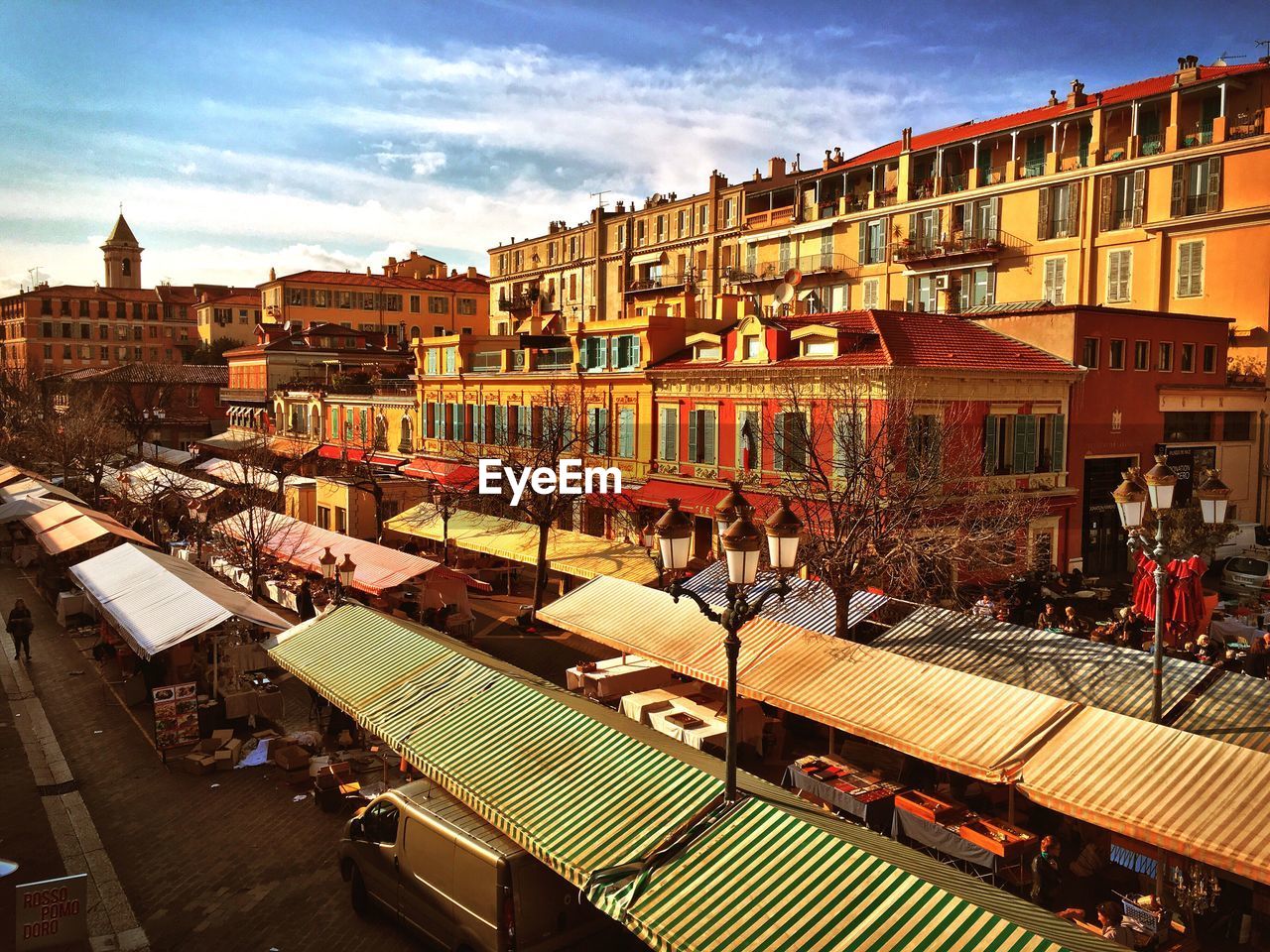 Buildings in city against sky