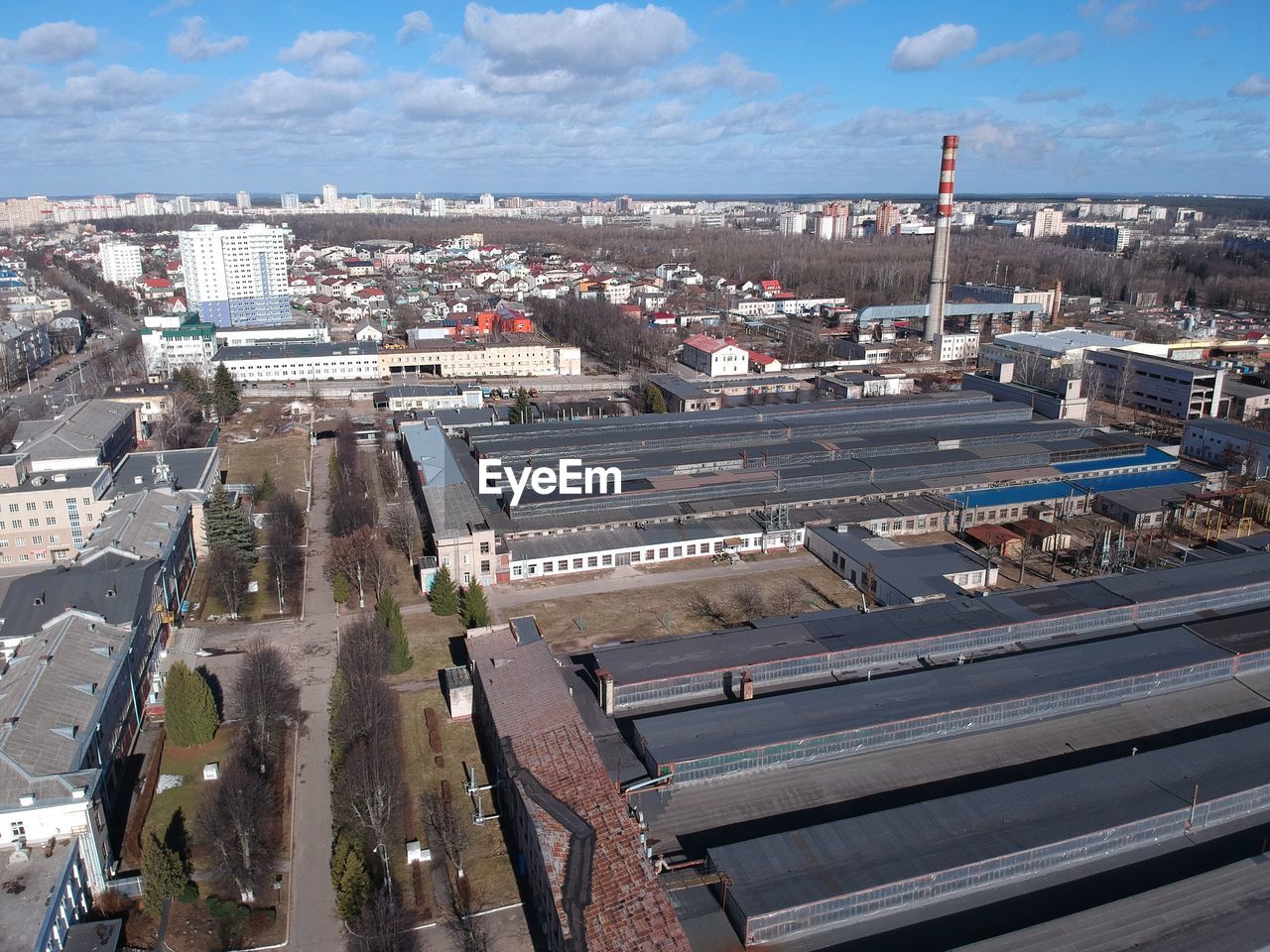 High angle view of buildings in city against sky