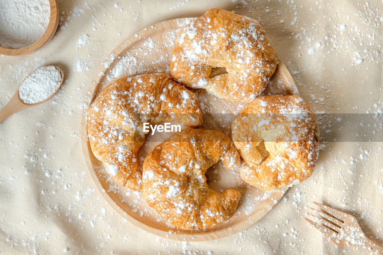 Croissant with icing top view shot