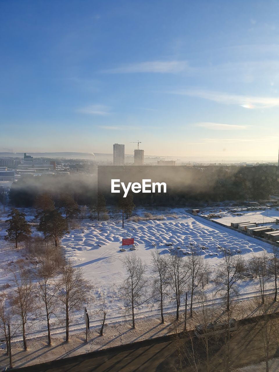 HIGH ANGLE VIEW OF BUILDINGS AND CITY DURING WINTER