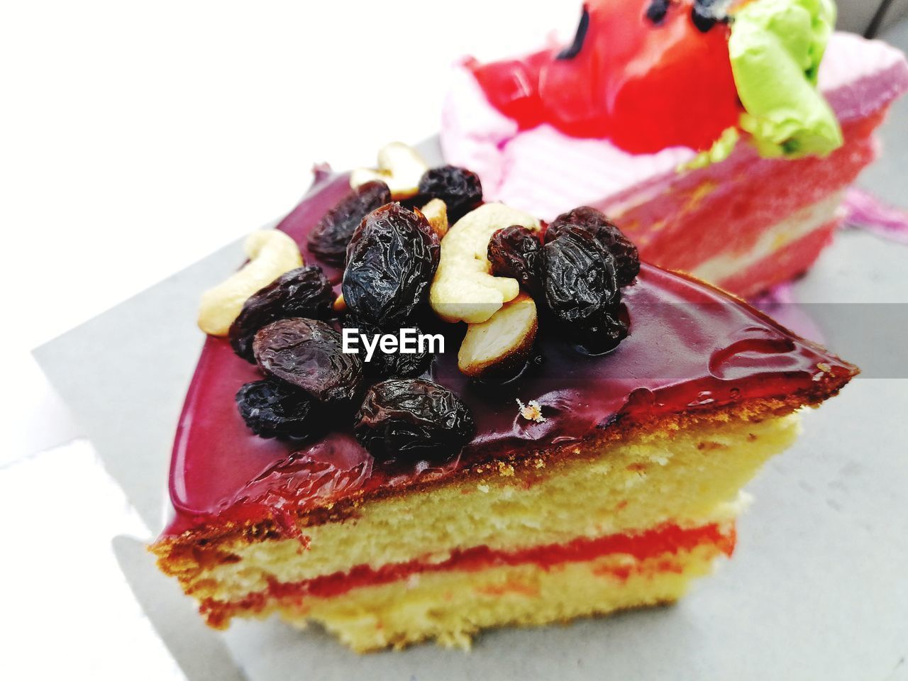 CLOSE-UP OF CAKE WITH ICE CREAM