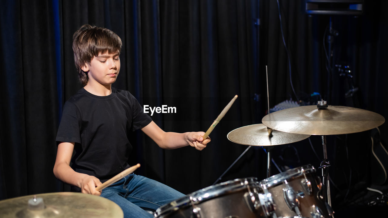 Young man playing piano