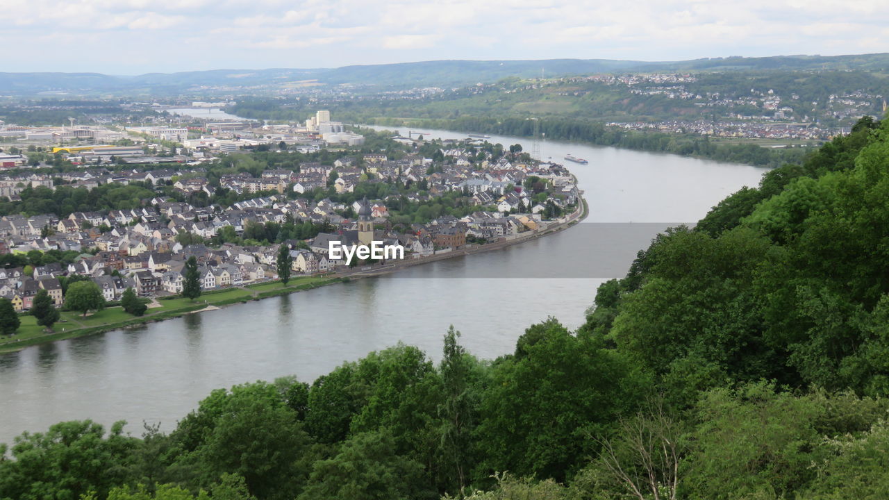 High angle view of rhine river amidst trees and building against sky