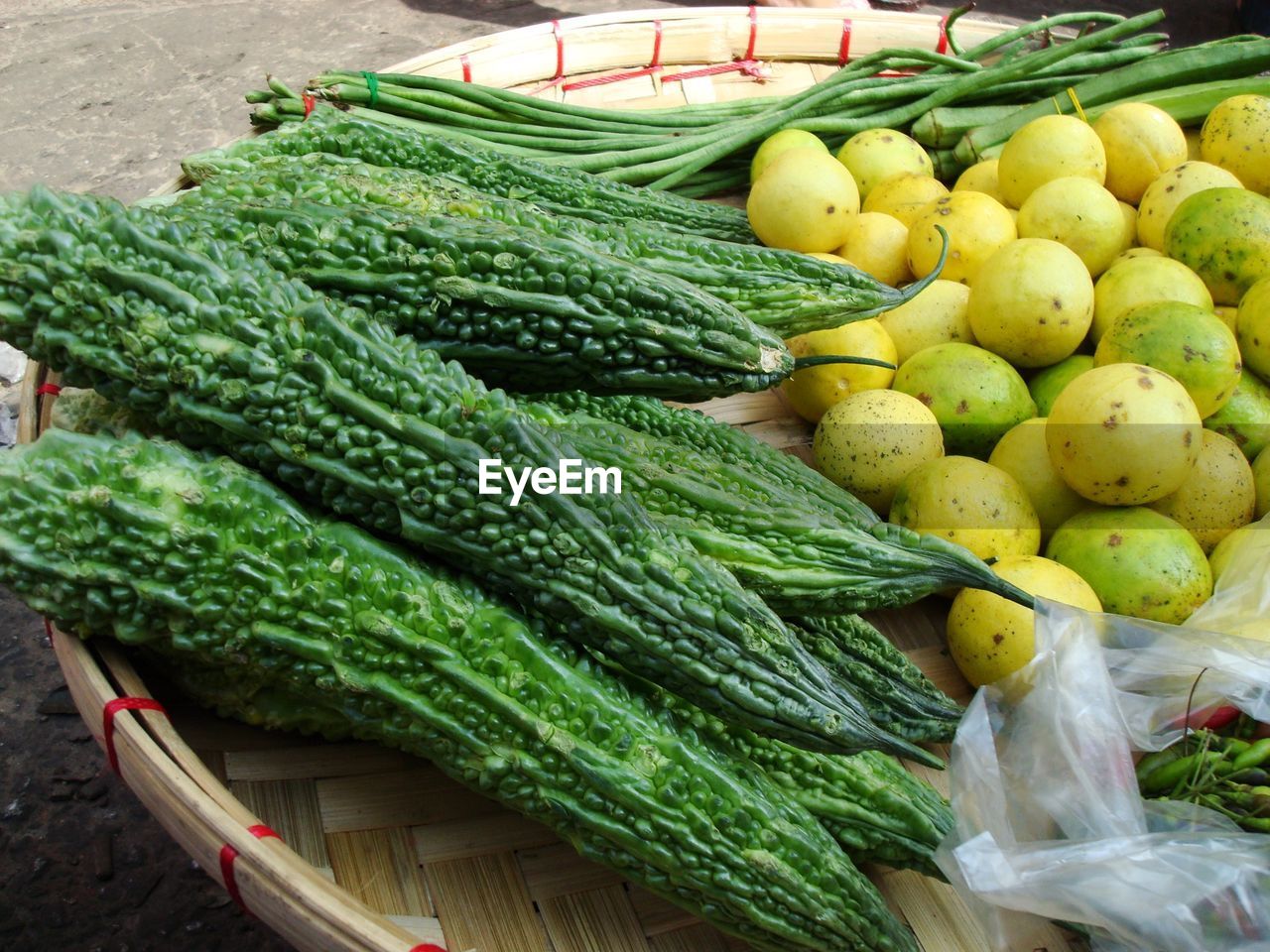 High angle view of vegetables for sale in wicker basket