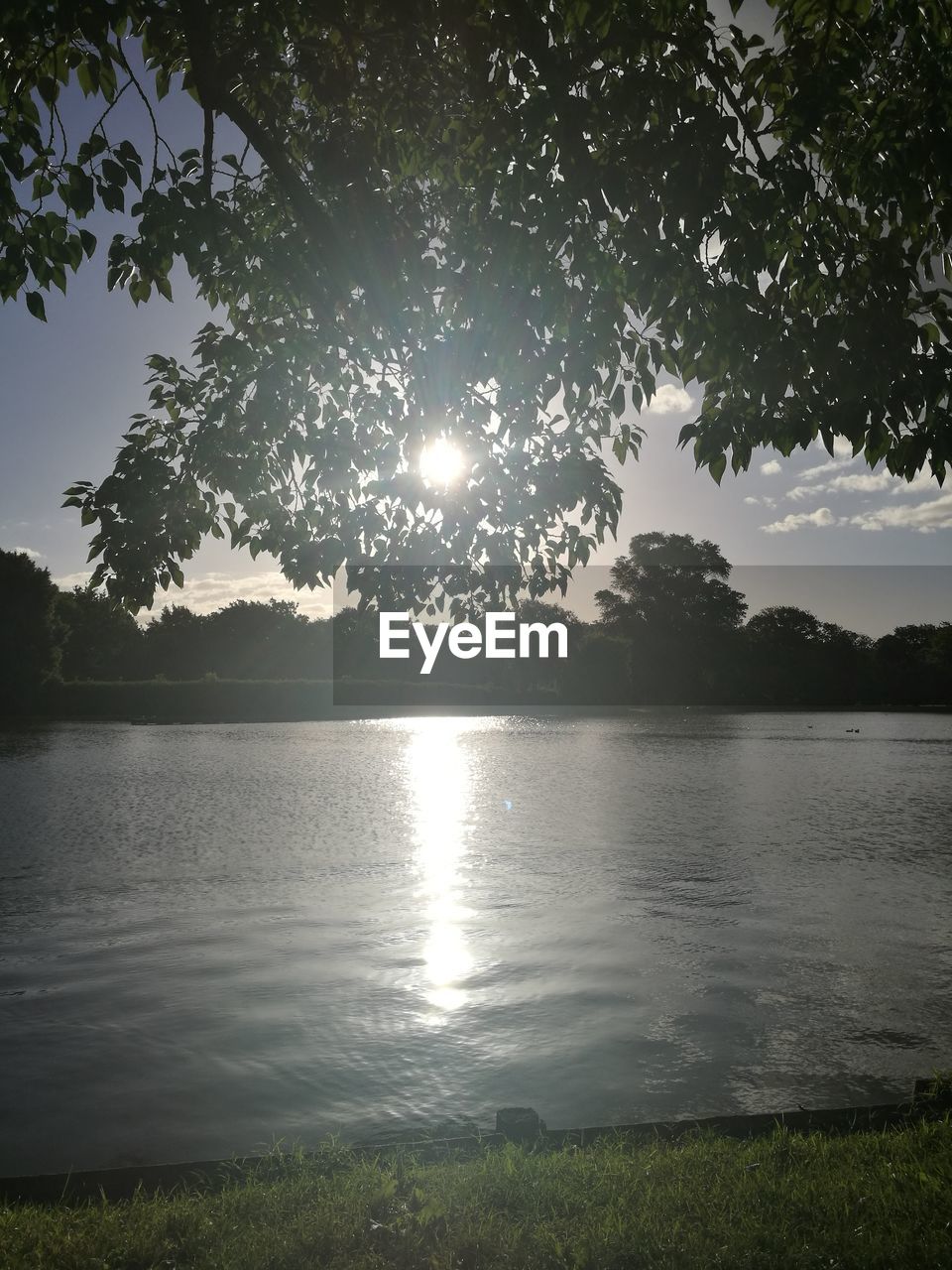 SCENIC VIEW OF LAKE DURING SUNSET