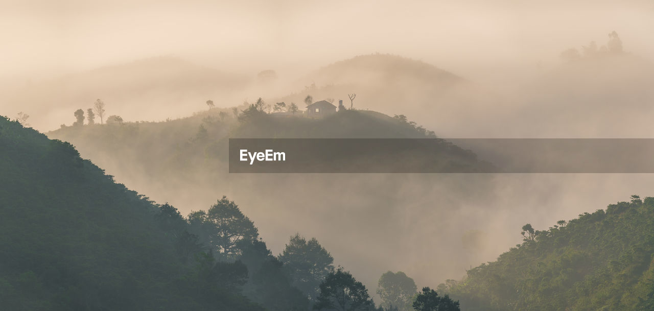 Scenic view of hills against sky during sunrise in bao loc town, lam dong province, vietnam