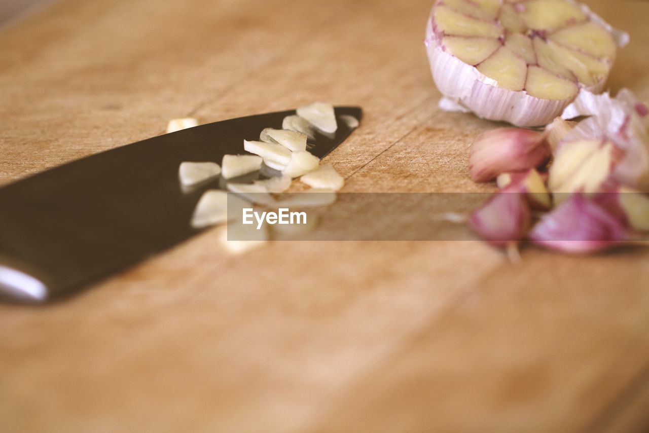 CLOSE-UP OF FLOWER PETALS ON TABLE