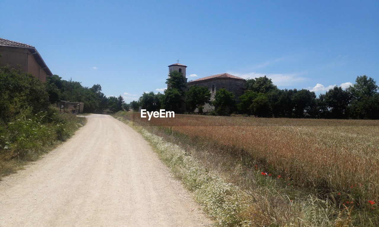 VIEW OF ROAD LEADING TOWARDS BUILDING