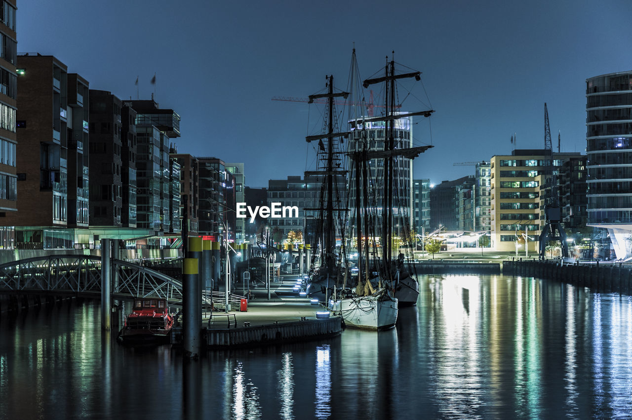 Sailboats moored at port of hamburg