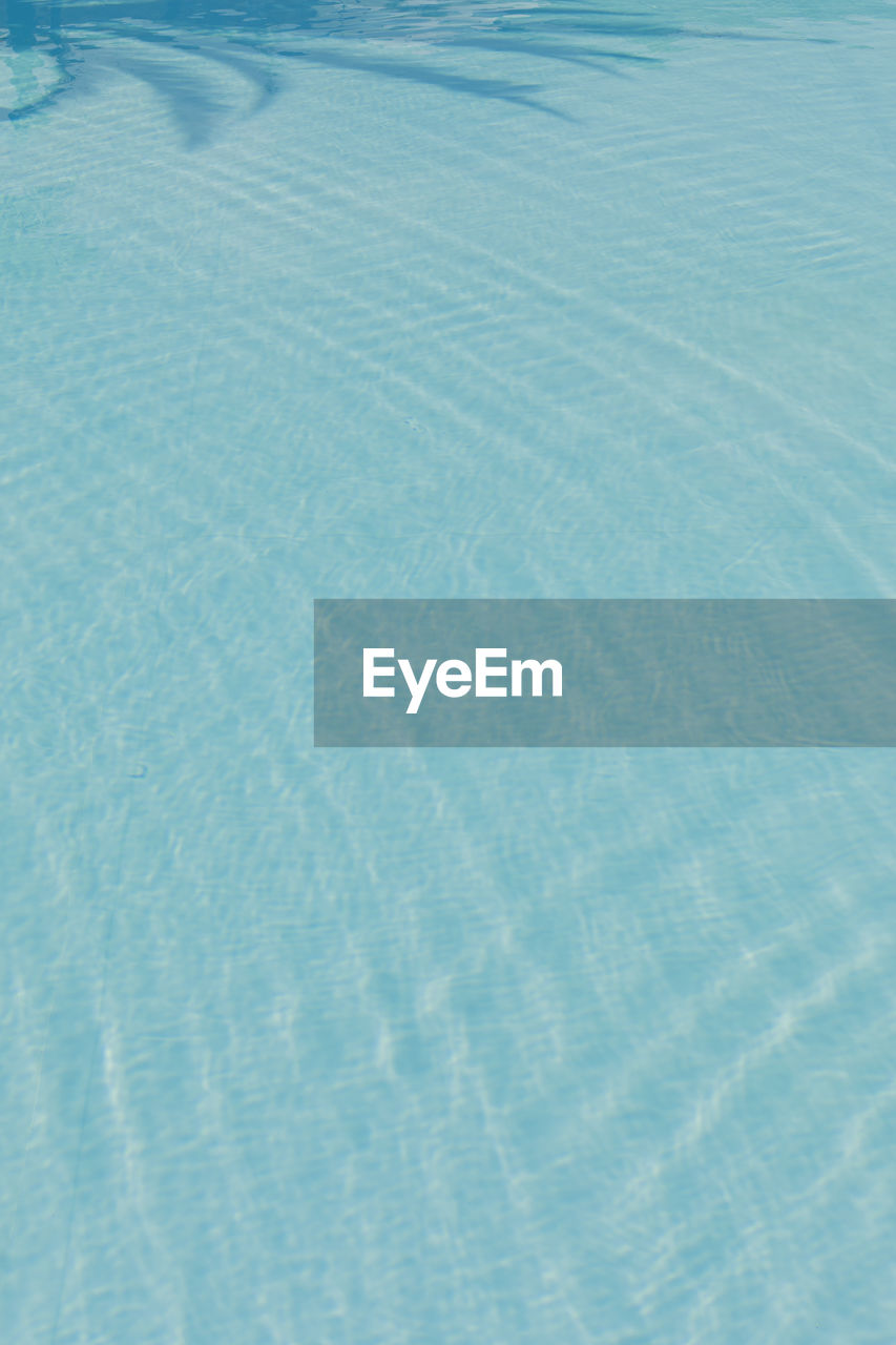 Minimalistic high angle view of swimming pool water texture