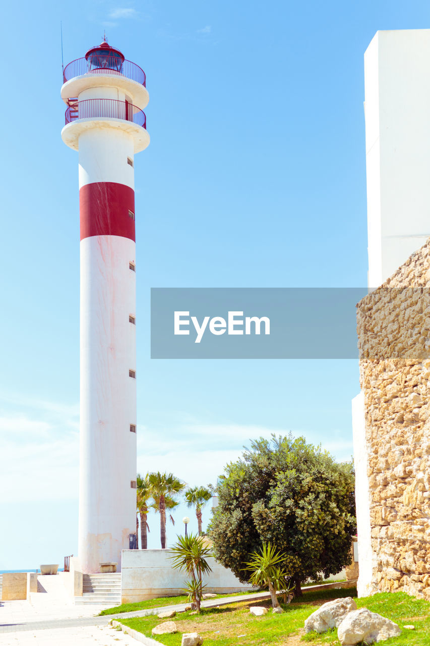 LIGHTHOUSE AGAINST CLEAR SKY