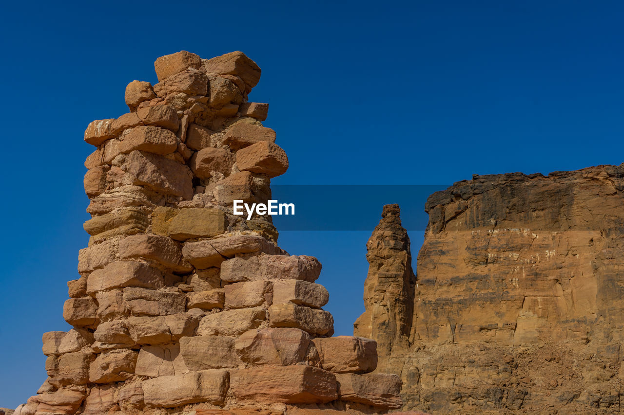 Almost completely destroyed remains of the wall of the temple of kamira , sudan