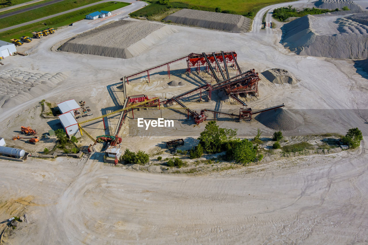 HIGH ANGLE VIEW OF CONSTRUCTION SITE AT DUSK