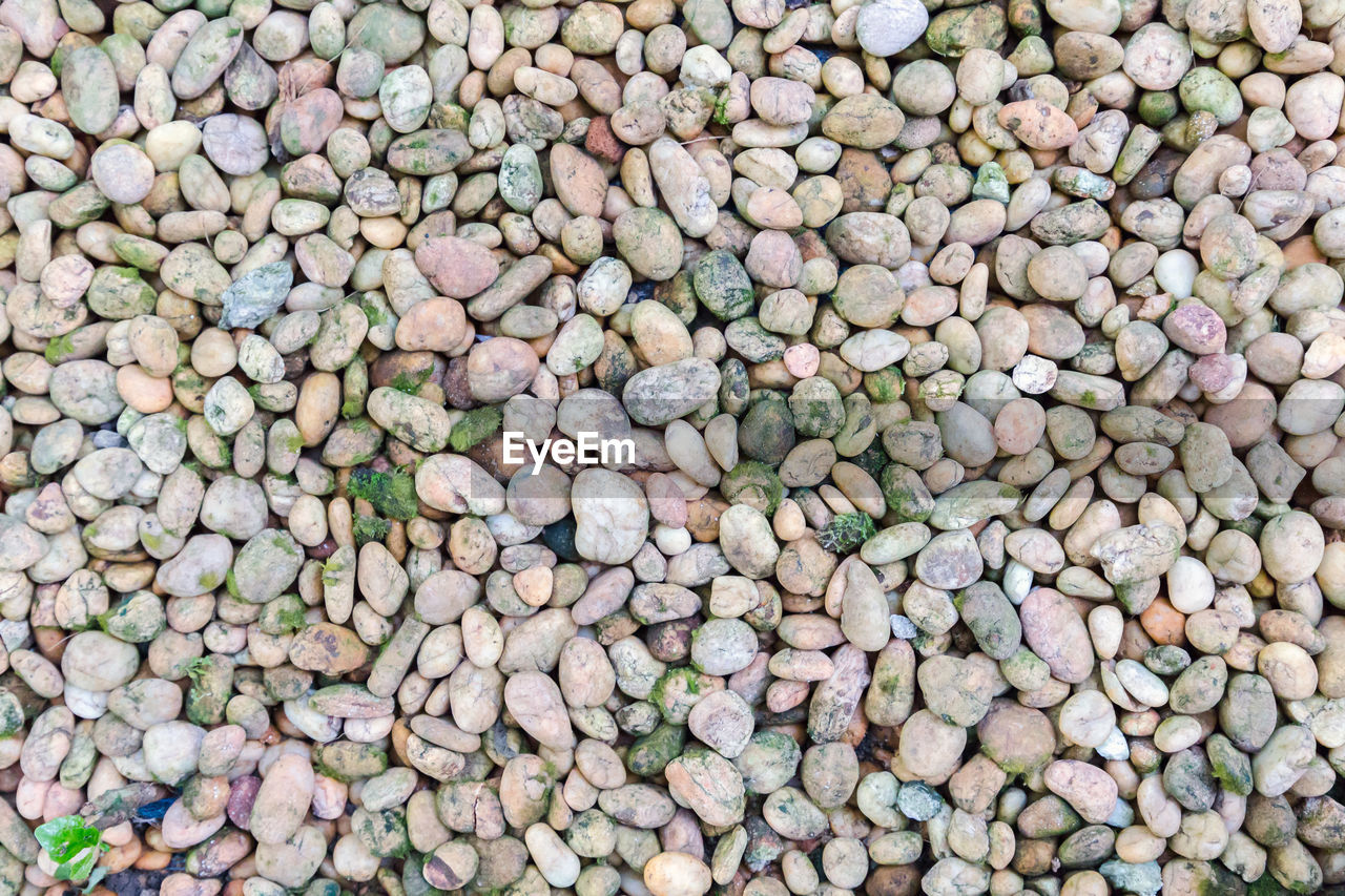 FULL FRAME SHOT OF PEBBLES AT MARKET STALL