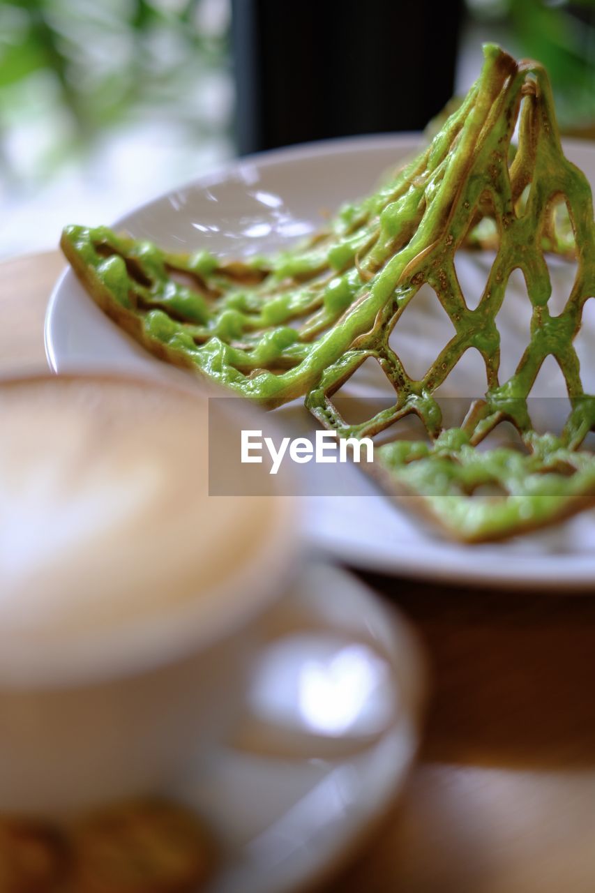 CLOSE-UP OF MEAL SERVED ON TABLE