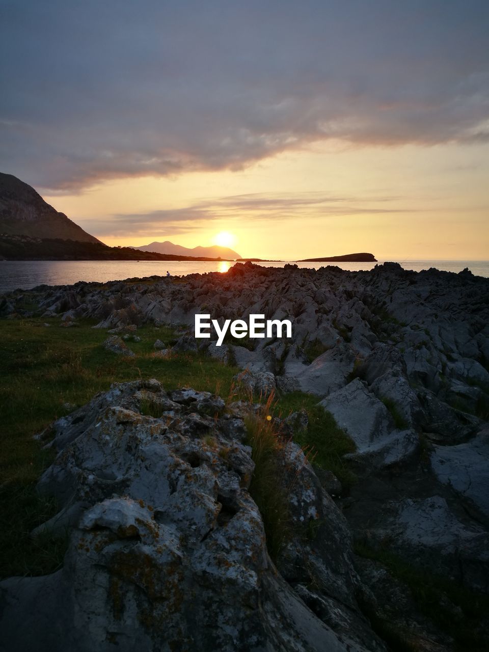 Scenic view of sea at sunset