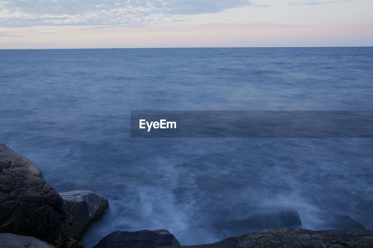 View of calm blue sea against the sky