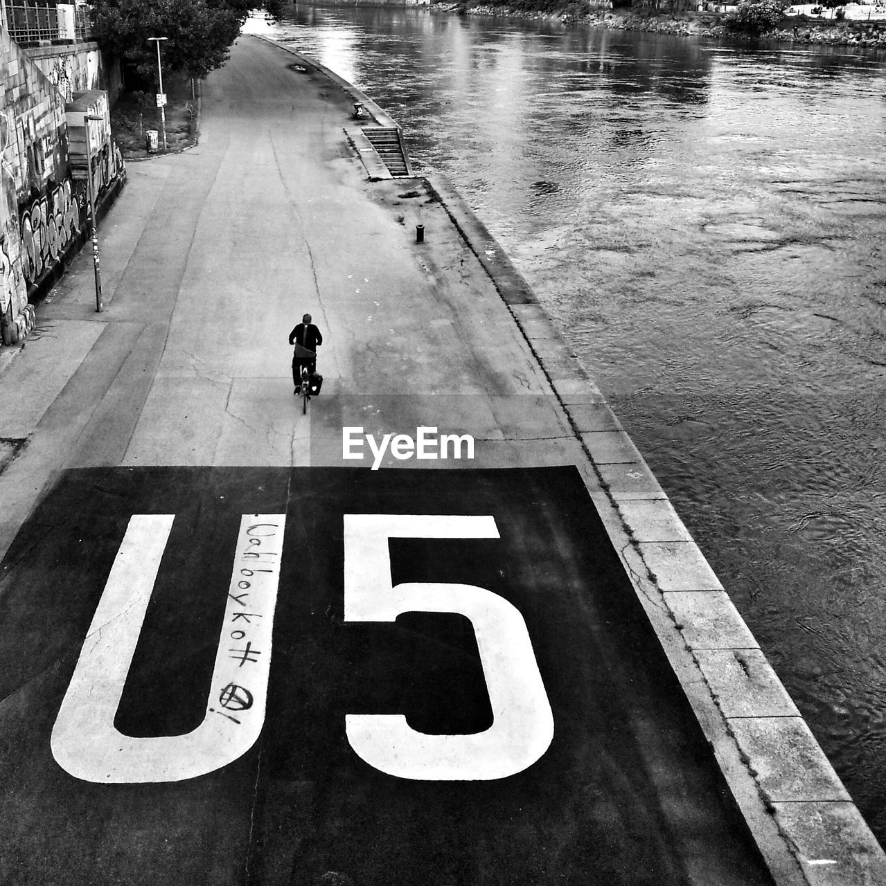 High angle view of text on street by river