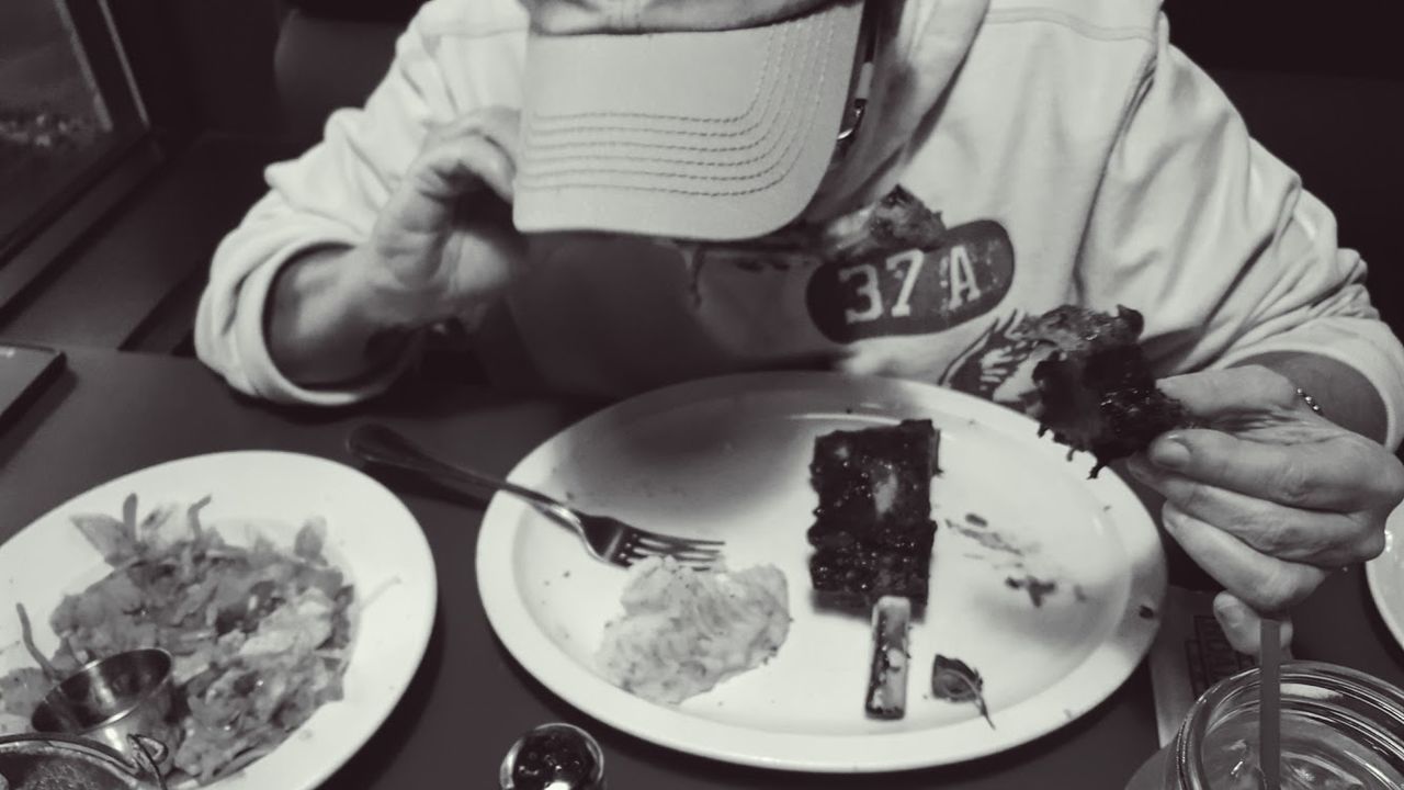 WOMAN EATING FOOD