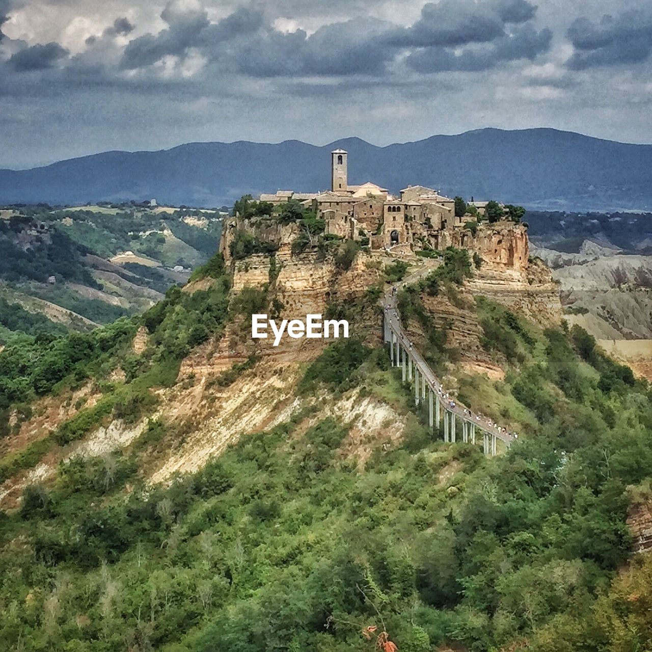 High angle view of castle on mountain against sky