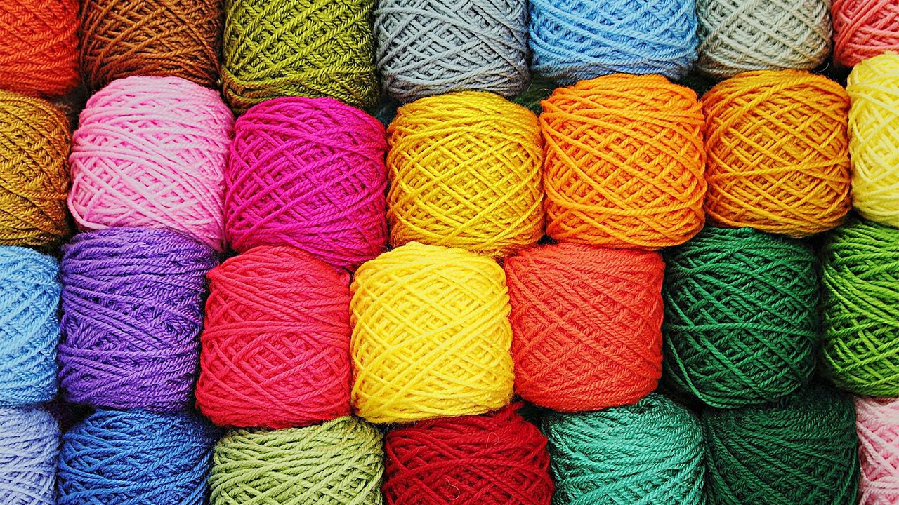 Full frame shot of shot of colorful wools for sale in shop