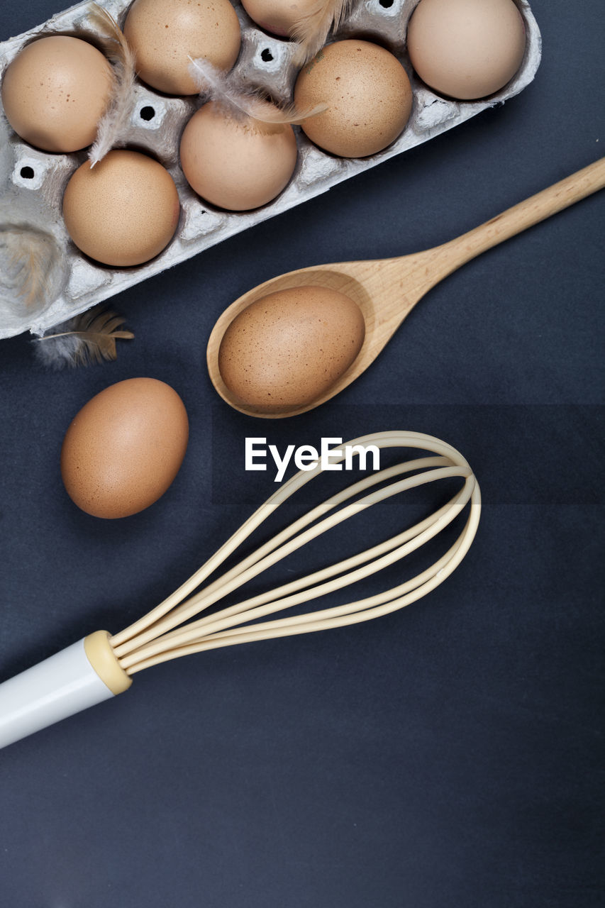 high angle view of eggs on table against black background