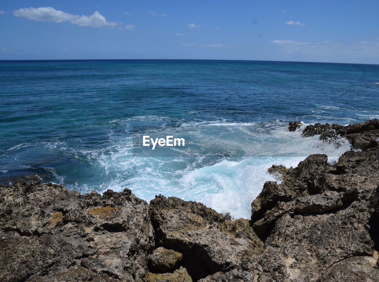 View of calm blue sea against the sky