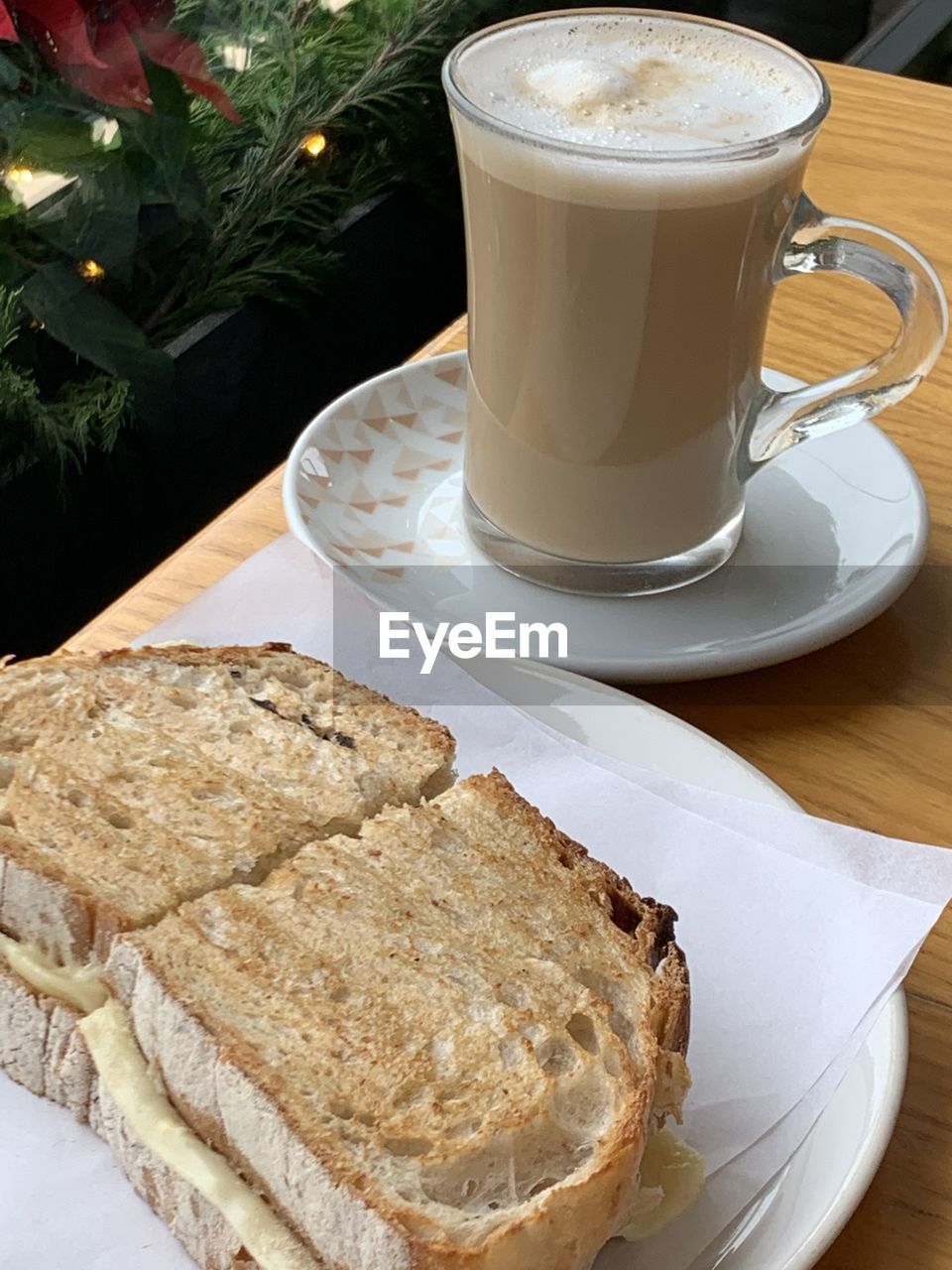 High angle view of food on table cappuccino and toast with cheese