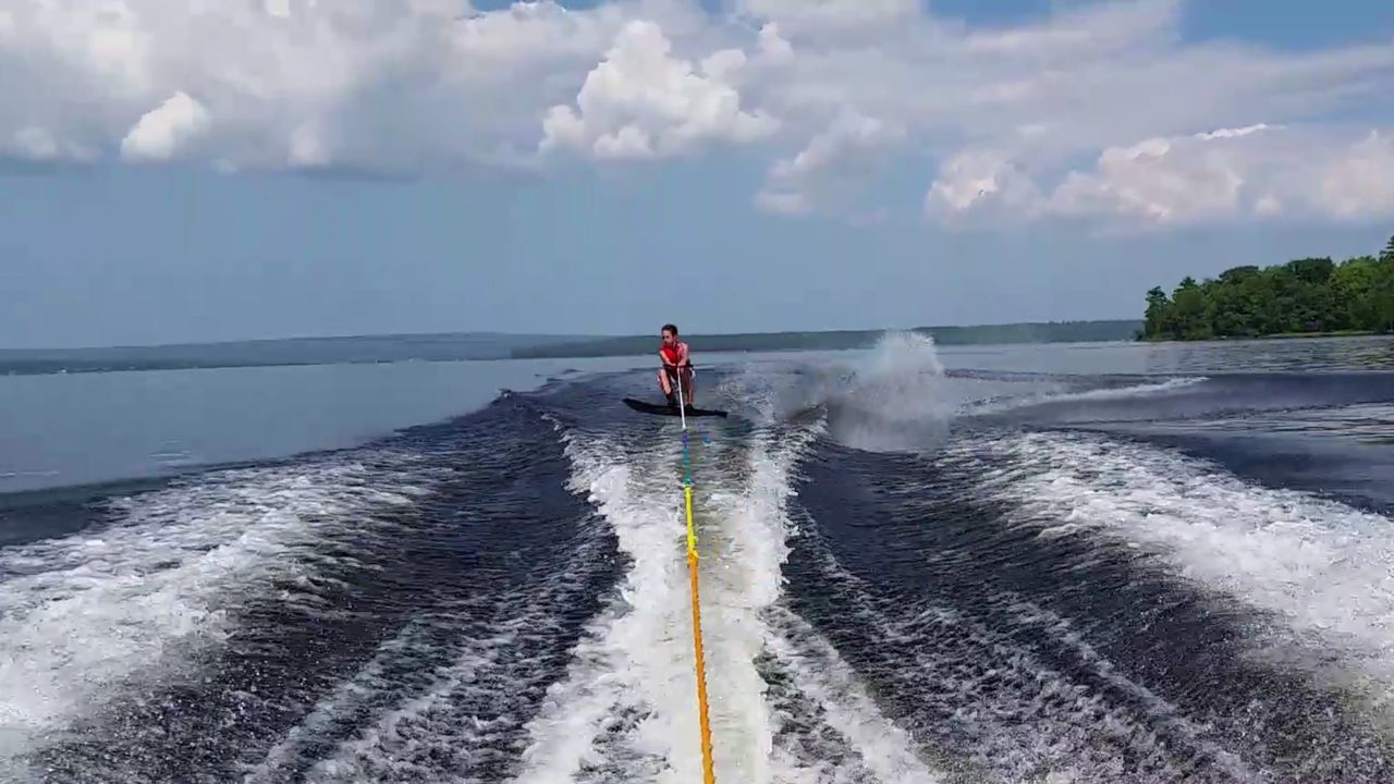 Person wakeboarding in sea