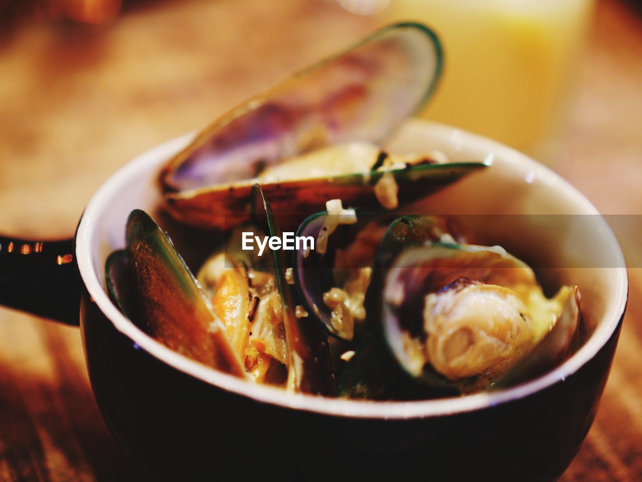 Close-up of mussels in bowl on table