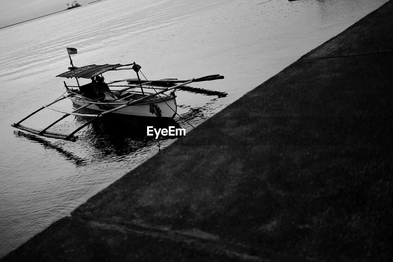 High angle view of boat moored on sea