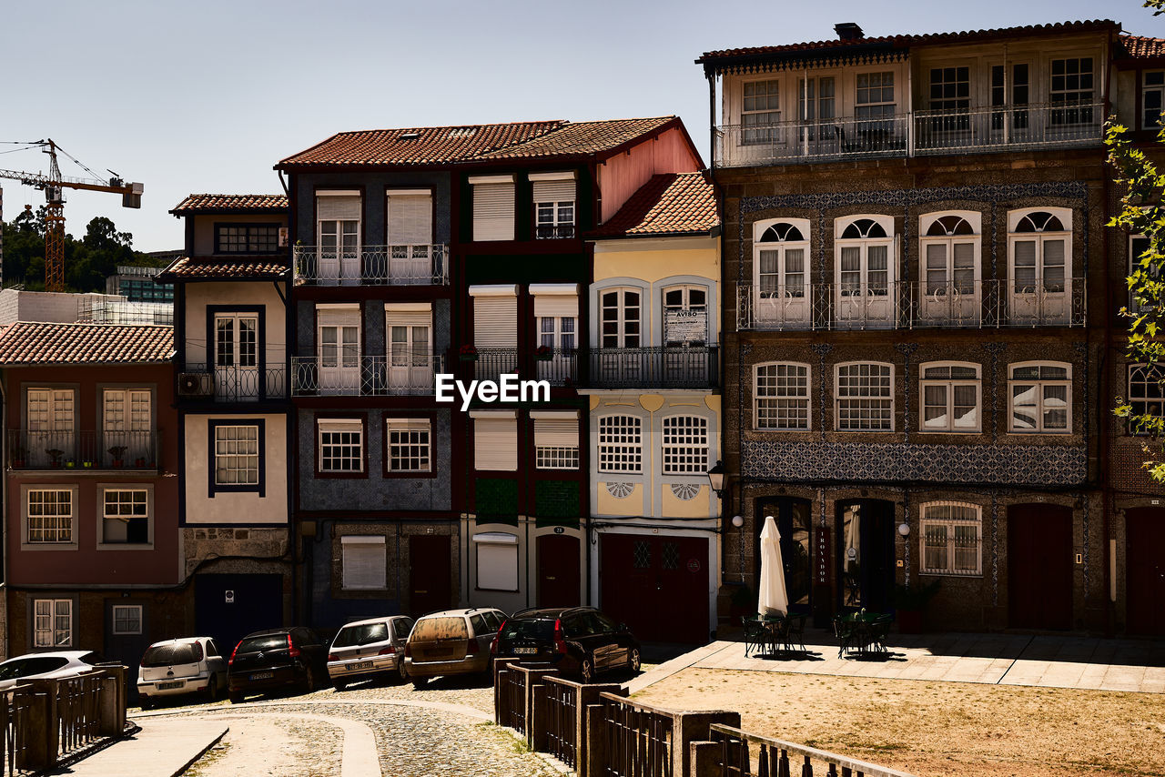 Buildings in city against sky