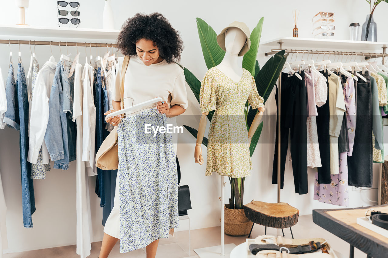 Portrait of woman standing in store