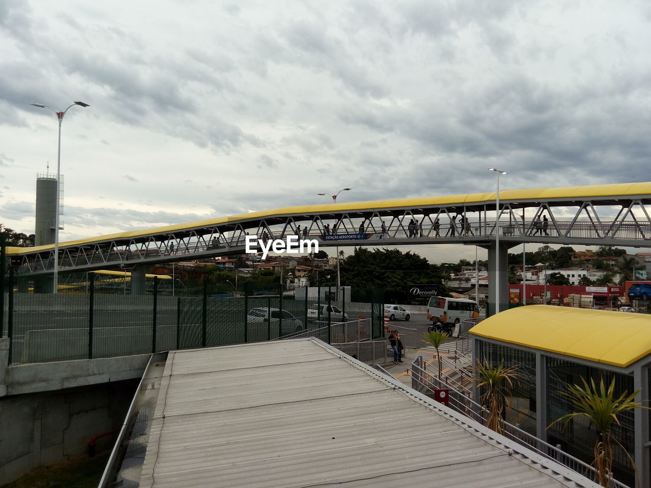 BRIDGE IN CITY AGAINST SKY