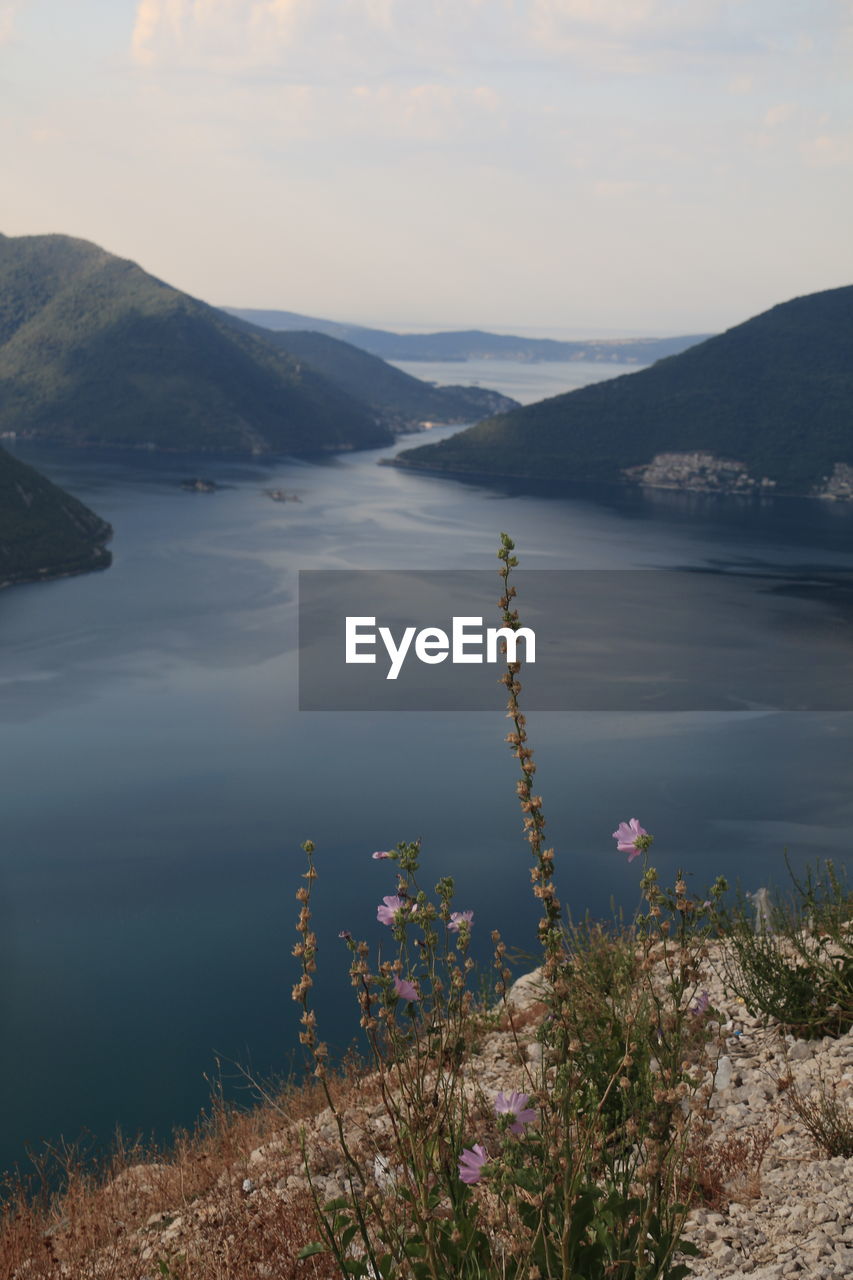 Scenic view of bay against sky