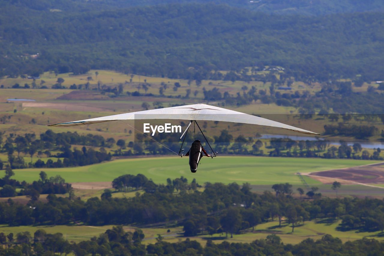 Hang glider taking off from tamborine mountain, queensland, australia.