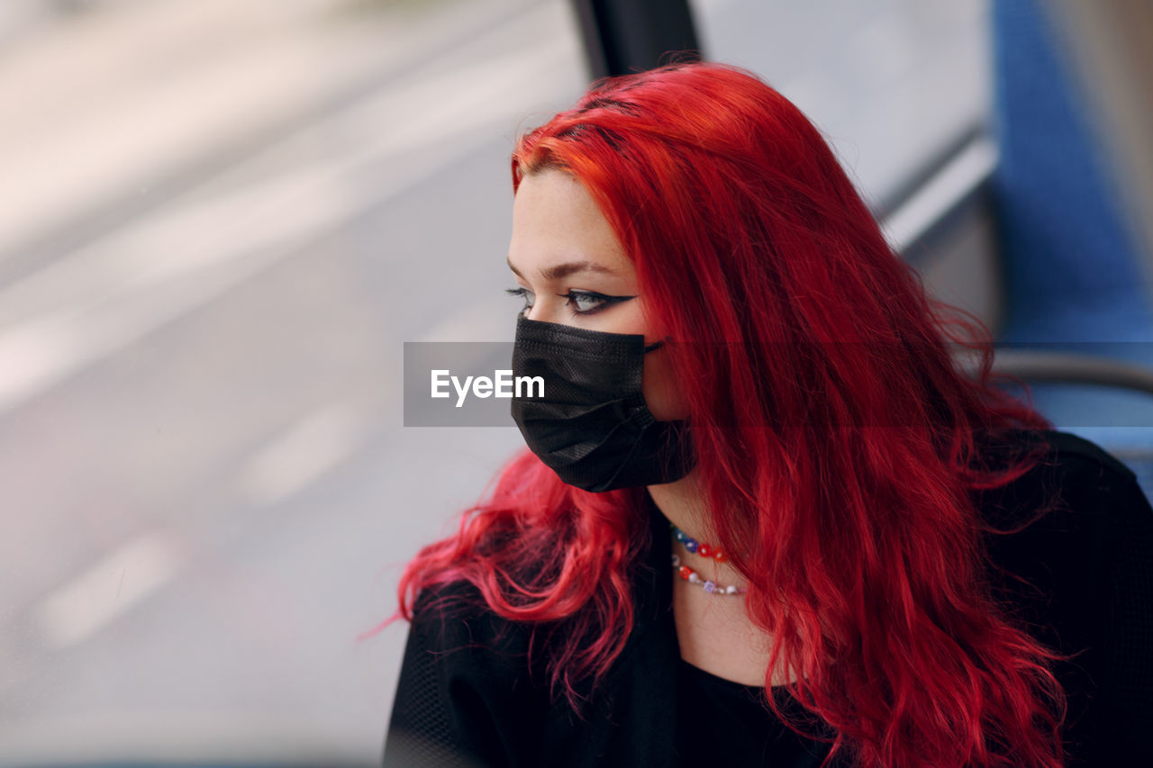 Portrait of young woman wearing sunglasses