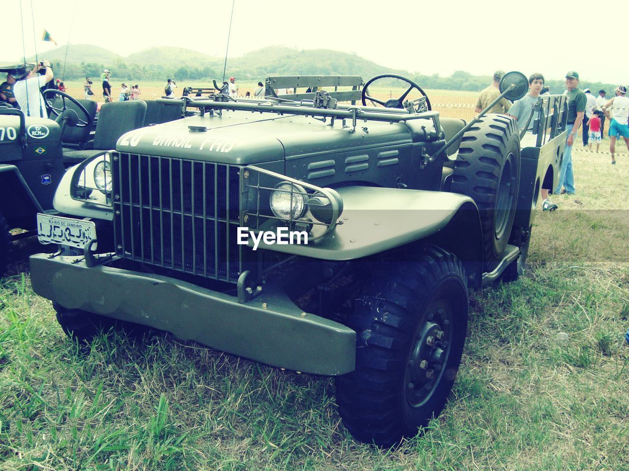 VINTAGE CAR ON GRASS IN PARK