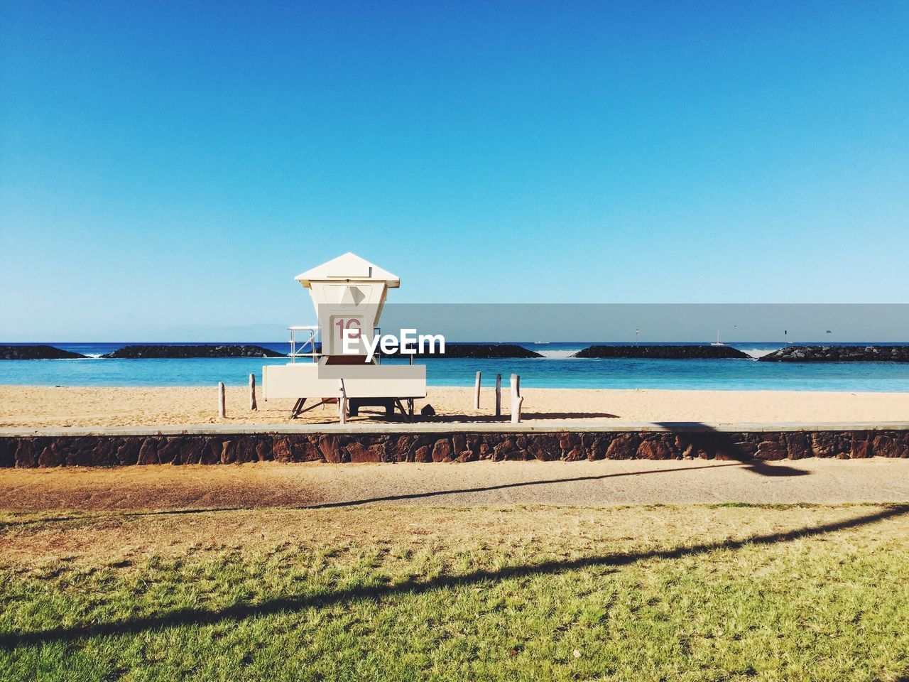 VIEW OF CALM SEA AGAINST CLEAR SKY