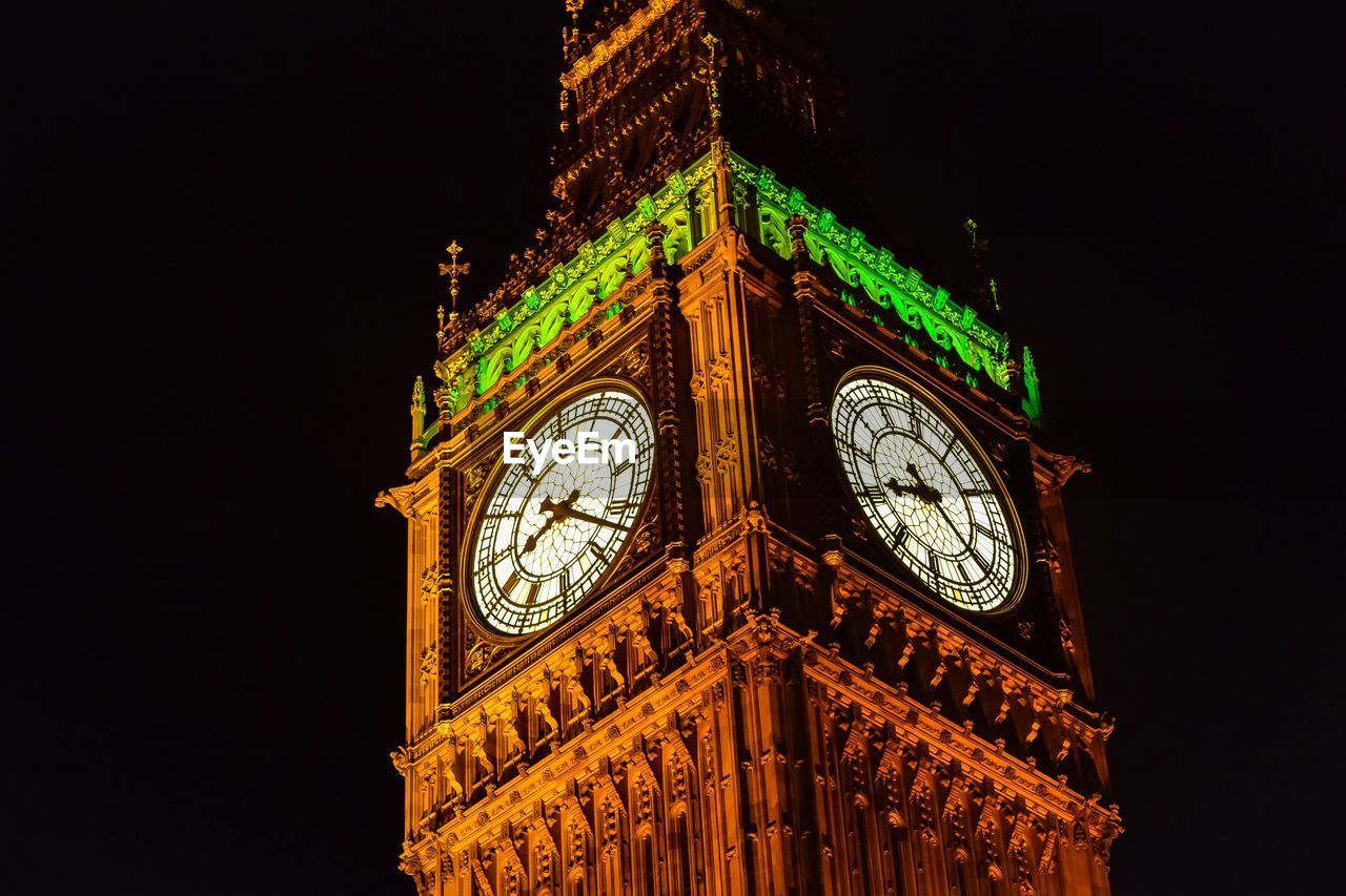 LOW ANGLE VIEW OF CLOCK TOWER AGAINST SKY