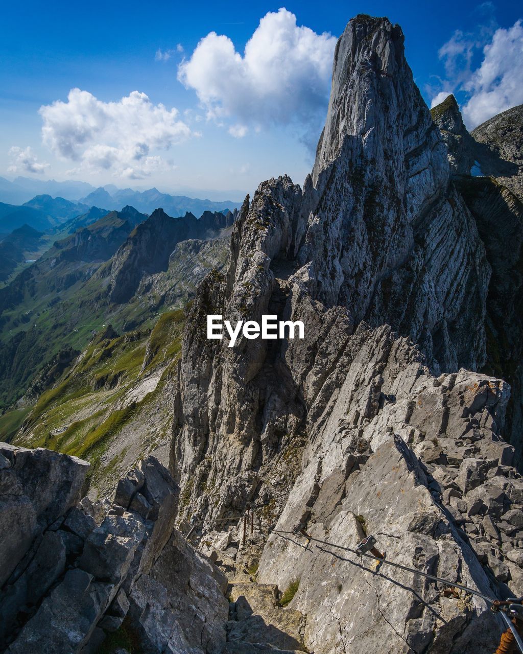 Rock formations on landscape against sky